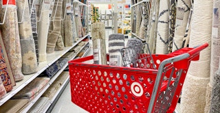 a target cart full of rugs with rugs in the background