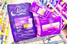 poise products in a walgreens shopping cart