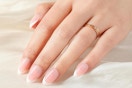 french tip nails on a woman's hand