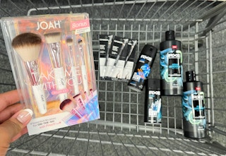 two Axe body washes, two Axe body sprays, one Joah Take Me With you Brush kit, and three Covergirl eye pencils inside cart