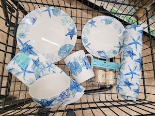 nautical themed dishes in a cart