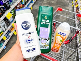 three bottles of body wash in cart