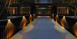 solar fence lights on a wooden fence on a pathway
