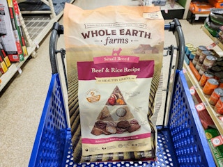 bag of dog food in a cart