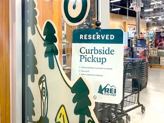 rei co-op curbside pickup sign inside store