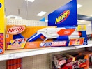 nerf blaster toy sitting on a target shelf