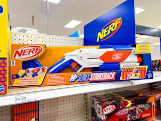 nerf blaster toy sitting on a target shelf