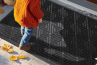 a doormat in front of a home