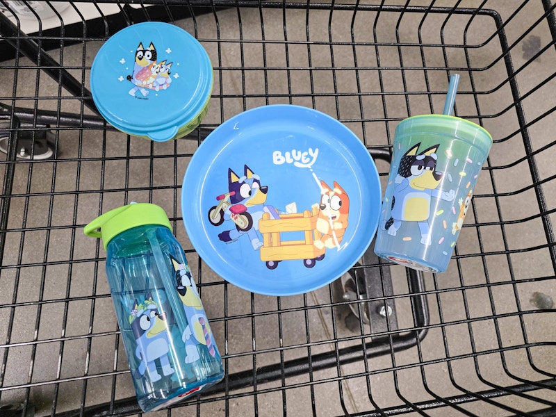 bluey plate, tumbler, water bottle, and snack container in a cart