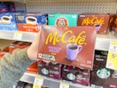 hand holding walgreens mccafe coffee pods