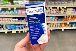 hand holding panoxyl overnight pimple patches