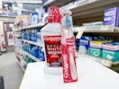 colgate toothbrush and mouthwash on walgreens shelf