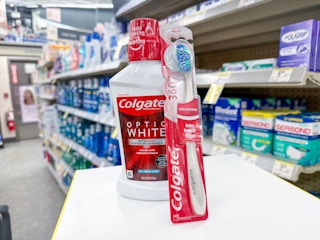 colgate toothbrush and mouthwash on walgreens shelf