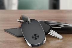 air tracker tag on table with keys