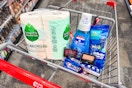seventh generation toilet paper, crest toothpaste and mouthwash, gillette razors, and maybelline eyeshadows in a cart