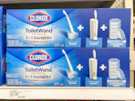 Two Clorox ToiletWand Cleaning kits sitting on a store shelf with a price sticker underneath them.