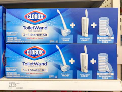 Two Clorox ToiletWand Cleaning kits sitting on a store shelf with a price sticker underneath them.