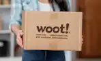 someone holding a woot box