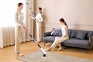 Lifestyle image of a woman using an electric spin brush in 3 different ways to clean her house