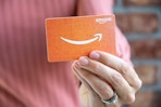 amazon gift card in hand