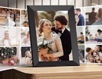 a digital picture frame on a table