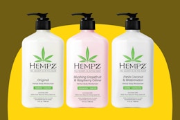 three pump bottles of lotion