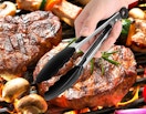 a hand holding a pair of cooking tongs