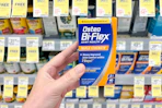 hand holding osteo bi-flex supplement