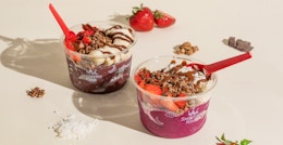 cocoa haze acai bowls from Smoothie King on a table with some fruit