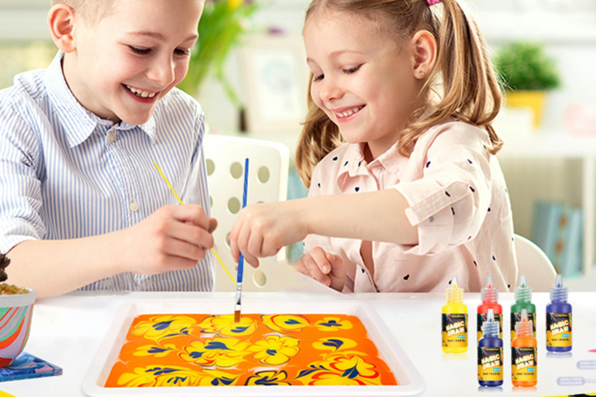 kids painting at table