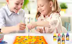 kids painting at table