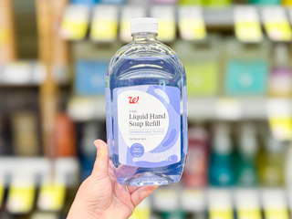 hand holding walgreens liquid hand soap refill