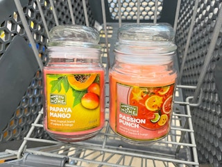 two Complete Home candles inside shopping cart