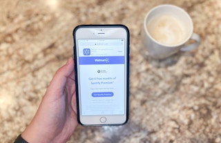 6 Months of Spotify Premium free for Walmart+ members offer page displayed on iPhone screen