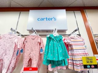 carters baby clothes display in store