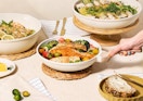 cooked food inside pots and pans