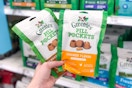 a hand holding pet pill pocket treat bags