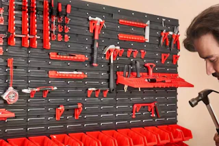 a man near a storage bin organizer