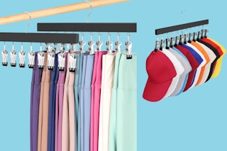 Three hangers with clips: one empty, one full of folded leggings, one full of baseball caps