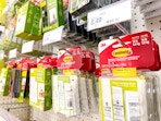 command adhesive strips hanging on a target shelf
