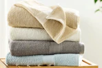 Lifestyle image of folded The Big One Bath Towels