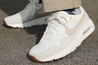 Nike Air Max Sneakers being worn by a person standing in the street