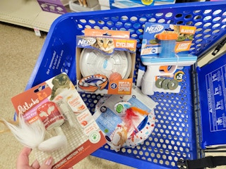 four cat toys in a cart