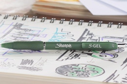 Sharpie S-gel pen on top of notebook
