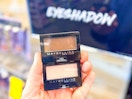 hand holding maybelline eye shadow singles