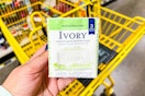 hand holding a pack of ivory bar soap