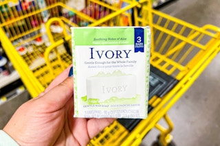 hand holding a pack of ivory bar soap