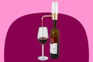 Stock image of the Automatic Wine Aerator being used on a bottle of wine