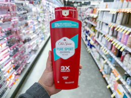 hand holding old spice body wash in walgreens