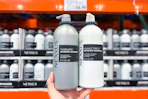 hand holding nexxus hair care at costco